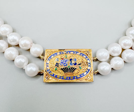 French antique gold clasp necklace on double strand of pearls